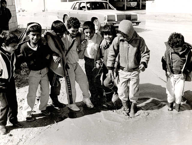 <p>DECEMBER 1986: Not everyone seems too dismayed at the muddy puddles and cold weather that have hit Bahrain during the past few days. These youngsters are obviously having a good time playing in the mud.</p>